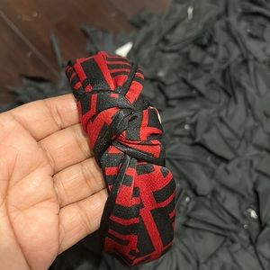 Black with red Fs all over headband